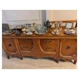 antique buffet and silver plate holloware