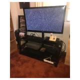 WORKING LARGE FLAT SCREEN TV AND STORAGE CABINET