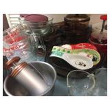 Pyrex measuring cups, spoon rest