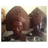 Carved wooden faces