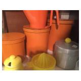 Vintage orange canisters, grease can