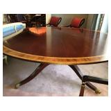 monumental sized (7 feet in diameter) antique mahogany round marquetry inlaid dining table with over