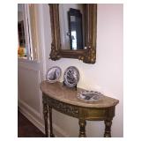 hand carved gold leaf marble topped demilune table and Della Robbia motif gilded mirror
