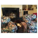 Pair overstuffed chairs w ottomans, books, large brass candle sticks