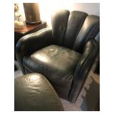 Two Slate gray leather swivel rockers and one ottoman by Leather Plus
