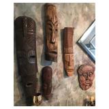2Wooden Carved Masks from Africa and a Stoneware Early Face I, by Rothy Moseley