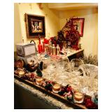 Bar area full of accessories from Red Vases to Candles to Glasses