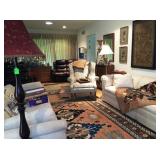 Pair white sofas, large oriental rug, wing-back chairs, Victorian crazy quilt