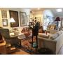 House filled with art, furniture, lamps and decoratives
