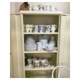Metal cabinet and dishes 