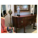 Sideboard with liquor storage compartment
