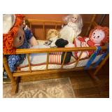 Assorted Dolls and childs play crib  