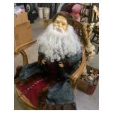 Santa in swivel cane seat chair 