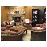 Pair wicket settees, pair matching chairs, ottoman, pair lit curio cabinets