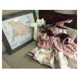 Collectable doll, framed map