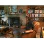 leather recliner, books, decoratives