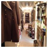 Hallway with Military dress coat, art work, clocks