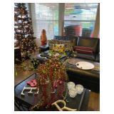 Black Rotating Christmas Tree and Wooden Santa