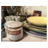 Serving platters and a honey pot