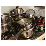 Assorted stainless pots and pans