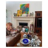 Living Area full of Art, Blue and White pottery, leather couches and more