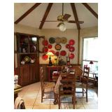 Decorative plates, ball and claw footed table, ladder back chairs