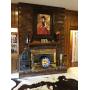 Cowhides, decorative birdcage, colorful plates, fireplace accessories