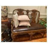 Hand carved Settee with leather seating 