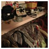 Assorted cameras, flash attachments, light meters, silde viewer