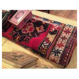 Area rug and vintage boxes