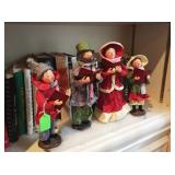 Caroler figurines, books