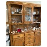 Built in hutch loaded with crystal, glass serving pieces, mid century trays, cake plates, bone chi