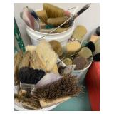 Large assortment of paint brushes for painting and waxing