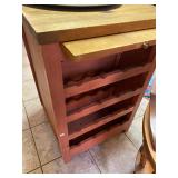 Kitchen Island back side with wine rack and cutting board