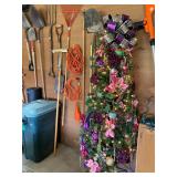 Fully decorated Christmas Tree and Yard Tools