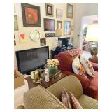 Den filled with artwork, electronics, Sanyo TV 48 inches and MORE