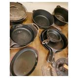 Large selection of cast iron skillets and dutch oven