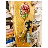 Large collection of antique door knockers all throughout the home