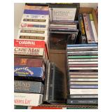 Three linear feet of VHS and CDs