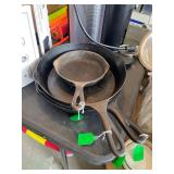 4 Cast iron skillets by Wagner and Lodge