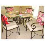 Round glass table and four chairs