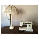 Vintage Kenmore sewing machine in cabinet, vintage lamps