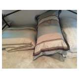 Matching comforter and king pillows with shams