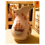 Unusual antique pitcher 