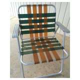 Webbed aluminum lawn chair in stunning condition