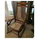 Antique rocker with webbed twine seat and back, quite unique