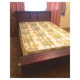 Full-size bed with shelving