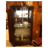 reproduction curio cabinet with carved detail
