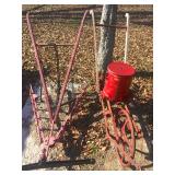 antique plows, wooden and metal