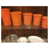 orange Tupperware canisters 